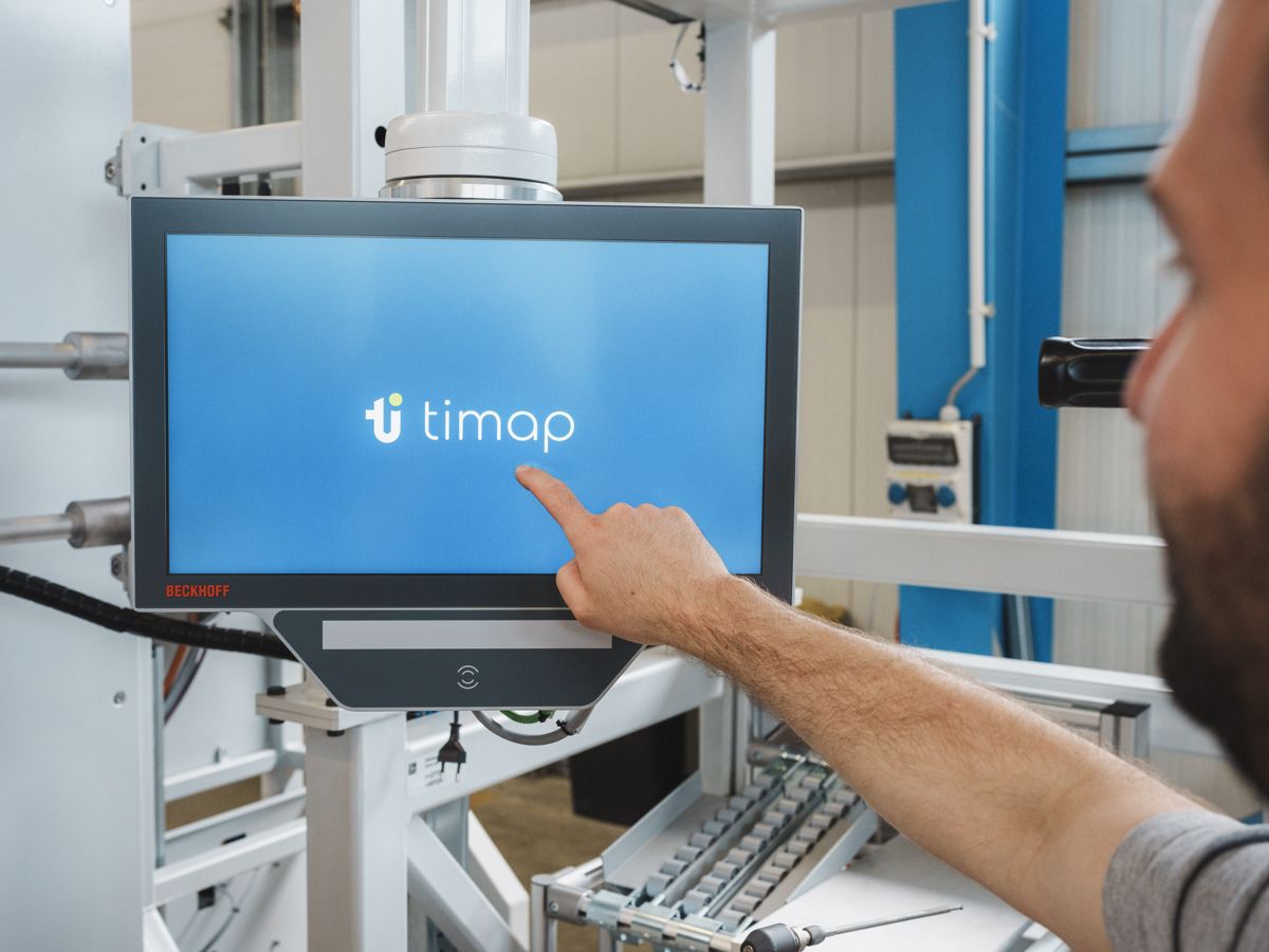 Operator at a machine touchscreen